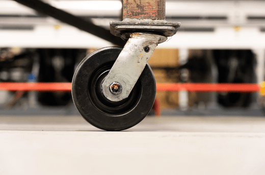 A castor wheel in operation on a factory floor after an expert advised his customer on the best way to operate it.