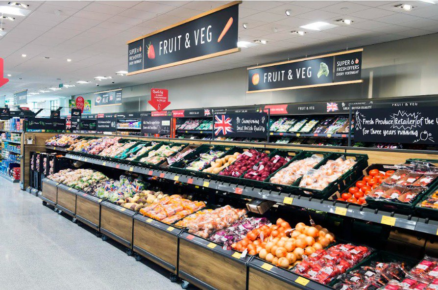 A retail stand in a supermarket using light weight castors to make them easier to move.